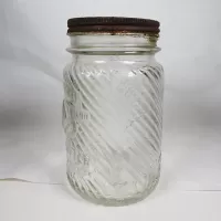 Jumbo Peanut Butter Vintage Embossed Clear Glass Jar: Left - Click to enlarge
