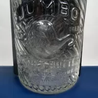 Jumbo Peanut Butter Vintage Embossed Clear Glass Jar: Front Closeup - Click to enlarge