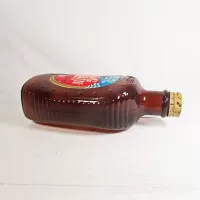 Eagle 1976 Brown Log Cabin Pancake Syrup Bottle: Top Side - Click to enlarge