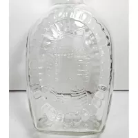Log Cabin with Flag Flask 1976 Pancake Syrup Bottle: Back Closeup - Click to enlarge