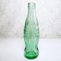 Peoria Illinois 6 fl. oz. empty no refill green glass hobbleskirt Coke bottle: Left - Click to enlarge