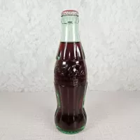 Jacksonville Florida vintage 8 oz full hobbleskirt no refill Coke bottle. Red Coca Cola Classic cap: Front - Click to enlarge