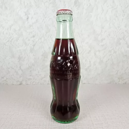 Jacksonville Florida vintage 8 oz full hobbleskirt no refill Coke bottle. Red Coca Cola Classic cap: Front