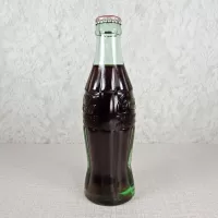 Atlanta Georgia Full Coke Bottle with Coca Cola Classic Cap: Left - Click to enlarge