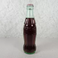 Akron Ohio Vintage 8 oz. Full Coke Bottle: Front - Click to enlarge
