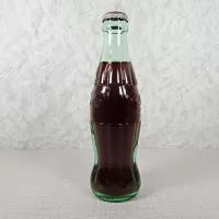 Akron Ohio Vintage 8 oz. Full Coke Bottle: Left - Click to enlarge