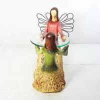 Angel and Child Emerging from the Earth Candle Warmer - Click to enlarge