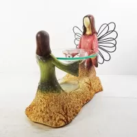 Angel and Child Emerging from the Earth Candle Warmer - Click to enlarge