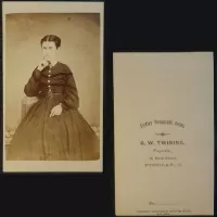 Antique CDV Carte De Visite Woman with Finger to Cheek: Front and Back - Click to enlarge