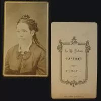 Antique CDV Carte De Visite Woman Tight Ringlet Curls: Front and Back - Click to enlarge