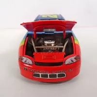 Nascar Jeff Gordon 1999 Rainbow No 24 Action Diecast Car: Hood Up - Click to enlarge