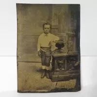 Antique Tintype Photo Sad Boy Leaning on a Short Pillar: Front - Click to enlarge