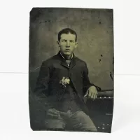 Antique Tintype Photo Sitting Man Boutonniere Dark Hand: Front - Click to enlarge