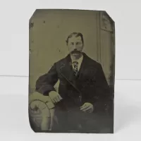 Antique Tintype Photo Man with a Caterpillar Mustache: Front - Click to enlarge