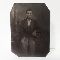 Antique Tintype Photo Man Sitting Fingers Spread Apart: Front - Click to enlarge