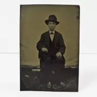 Antique Tintype Photo Sitting Man Wearing a Big Hat: Front - Click to enlarge